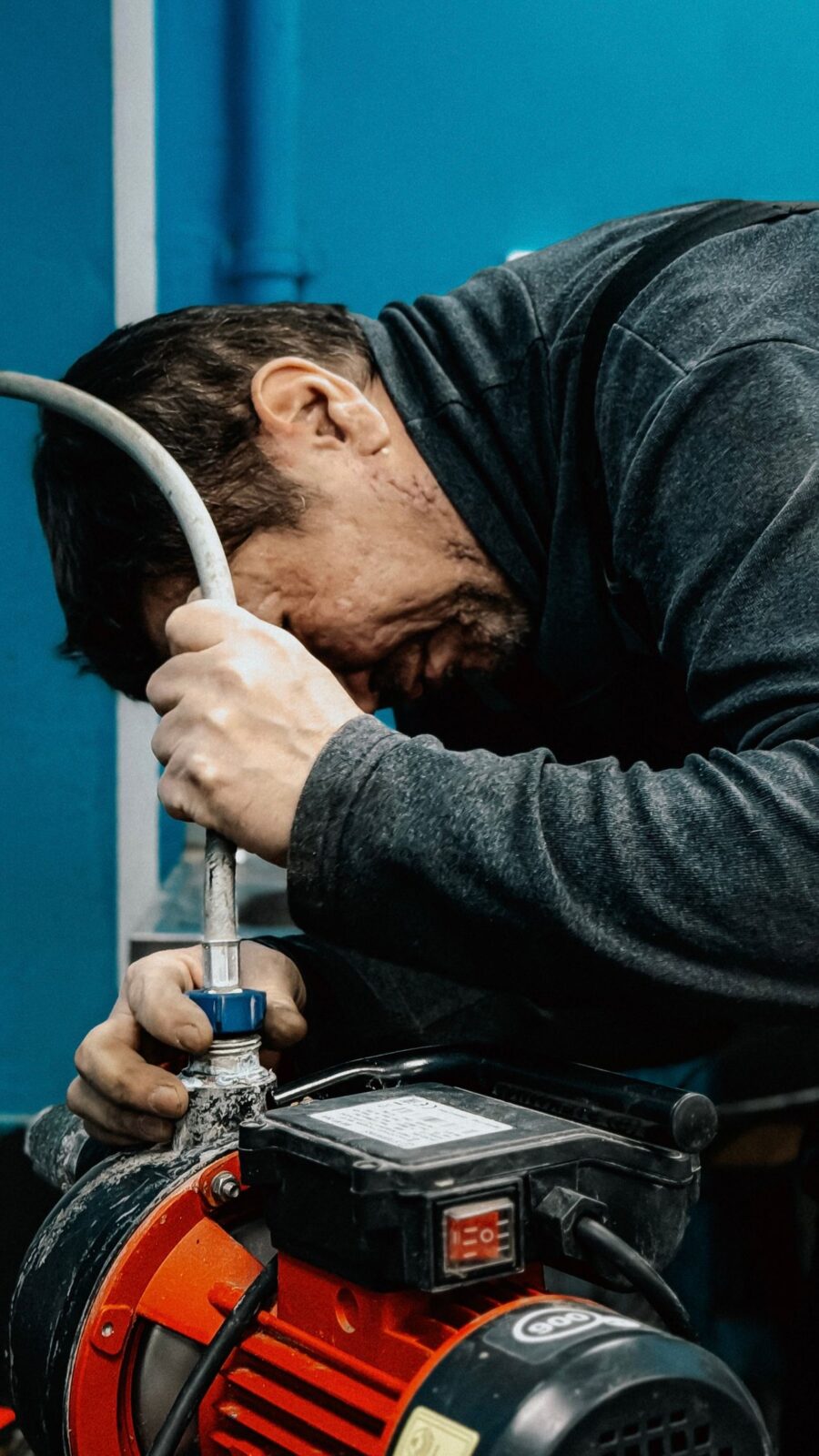 Well pump technician diagnosing a system in South Carolina